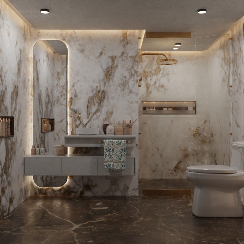 Luxury bathroom finished in large-format veined marble tile with brushed brass fixtures and backlit mirror